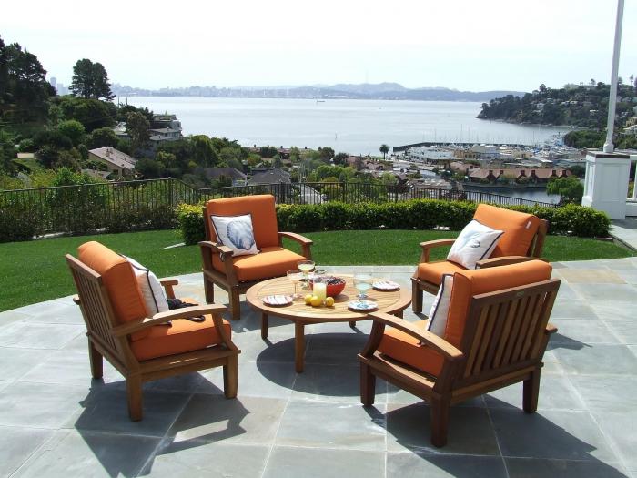 Chairs outside on the patio overlooking the sea