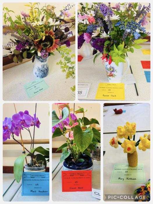 Photo shows prizes awarded to Bramble Down team for their flower arranging 