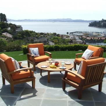 Chairs outside on the patio overlooking the sea